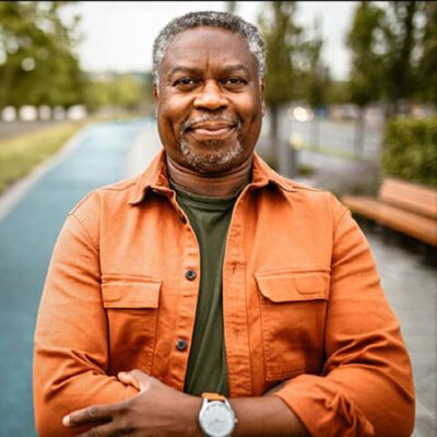 Older male Afro-American adult smiling